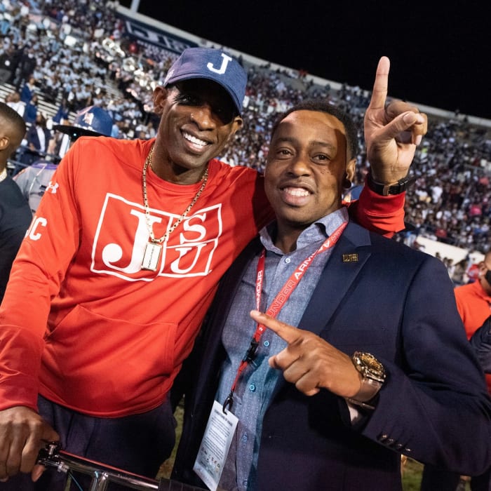 Jackson State head football coach Deion Sanders, left, and JSU Athletic Director Ashley Robinson